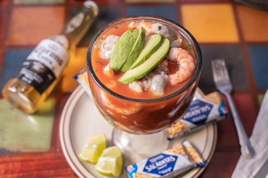 Shrimp cocktail topped with avocado